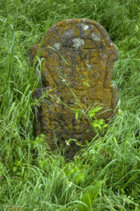 Надгробен камък в старото гробище на църквата &bdquo;Свети Георги Руян&ldquo;